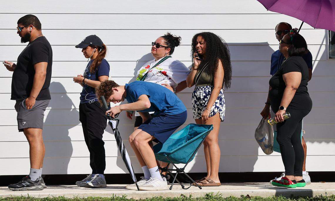 Customers line up for baked goods at the opening of Knaus Berry Farm.