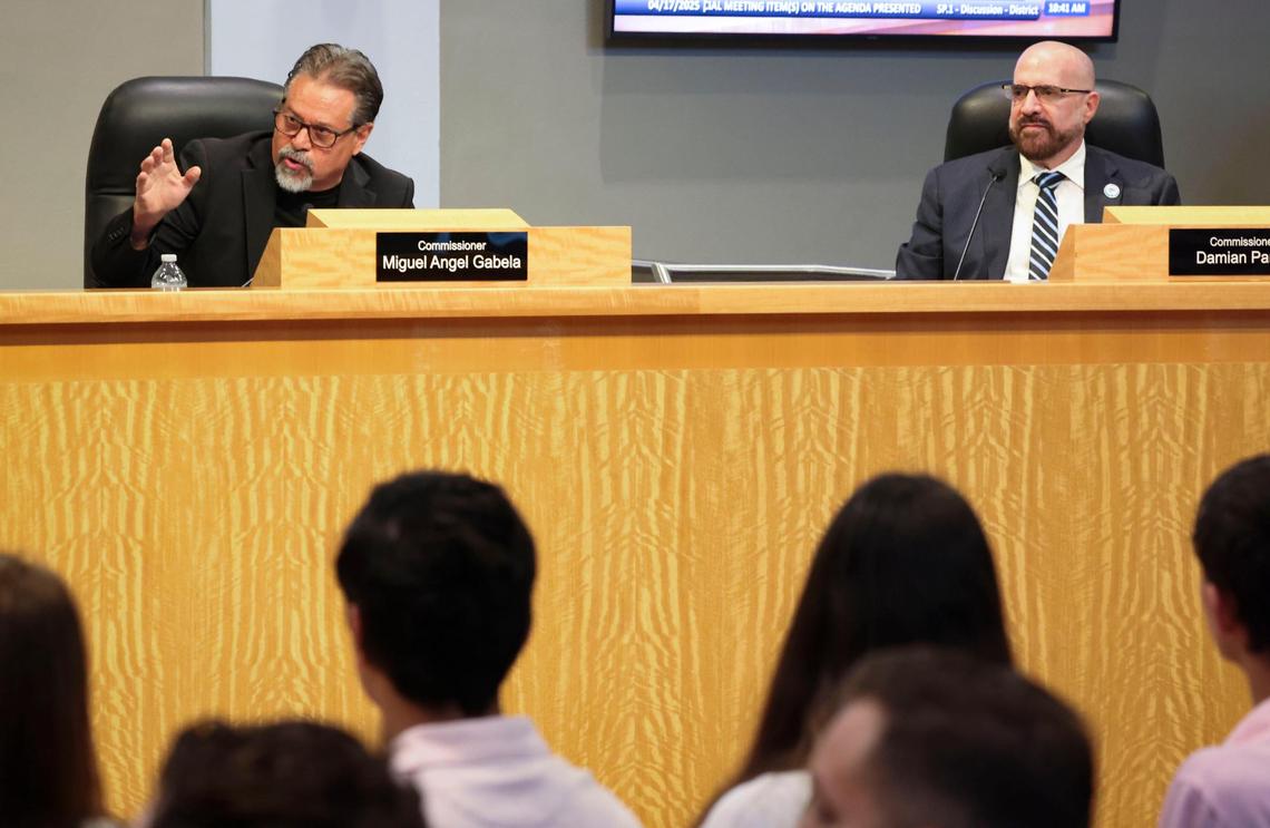 Commissioner Miguel Gabela, left, and Commissioner Damian Pardo, right, are pictured at a meeting on Thursday, April 17, 2025, at Miami City Hall in Coconut Grove.