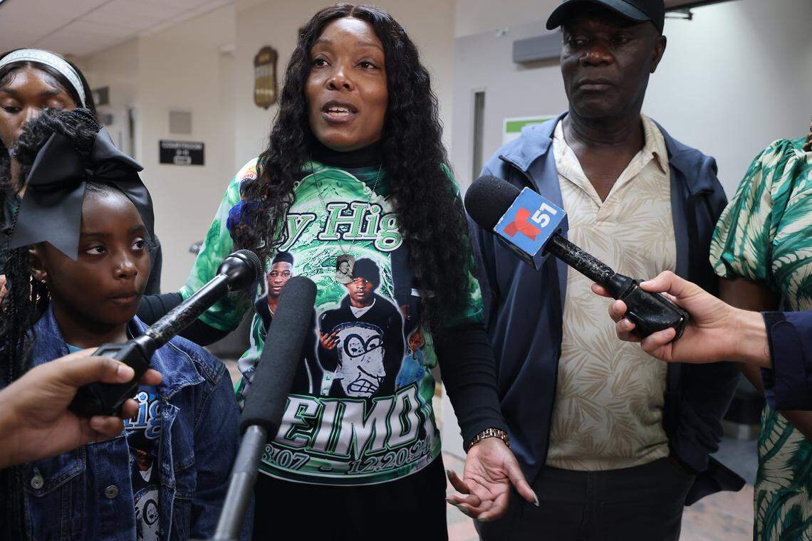 Standing with friends and family members Nathalie Jean, center, the mother of Northwestern student-athlete Yahkeim Lollar, who was stabbed to death in December 2024, speaks to reporters after the teen's loved ones decided they want to exercise their rights to a speedy trial on Thursday, Jan. 22, 2026, in Courtroom 2-8 inside Richard E. Gerstein Justice Building in Miami, Florida. Yahkeim's on-again, off-again girlfriend Jahara Malik is charged with manslaughter.