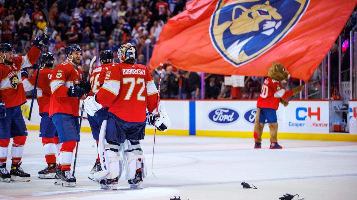 Florida Panthers goaltender Sergei Bobrovsky (72) left wing Jonathan Huberdeau (11) center Maxim Mamin (98) left wing Anthony Duclair (10) and center Aleksander Barkov (16) celebrate their 3-2 overtime win over the Toronto Maple Leafs during an NHL game at the FLA Live Arena on Saturday, April 23, 2022 in Sunrise, Fl.