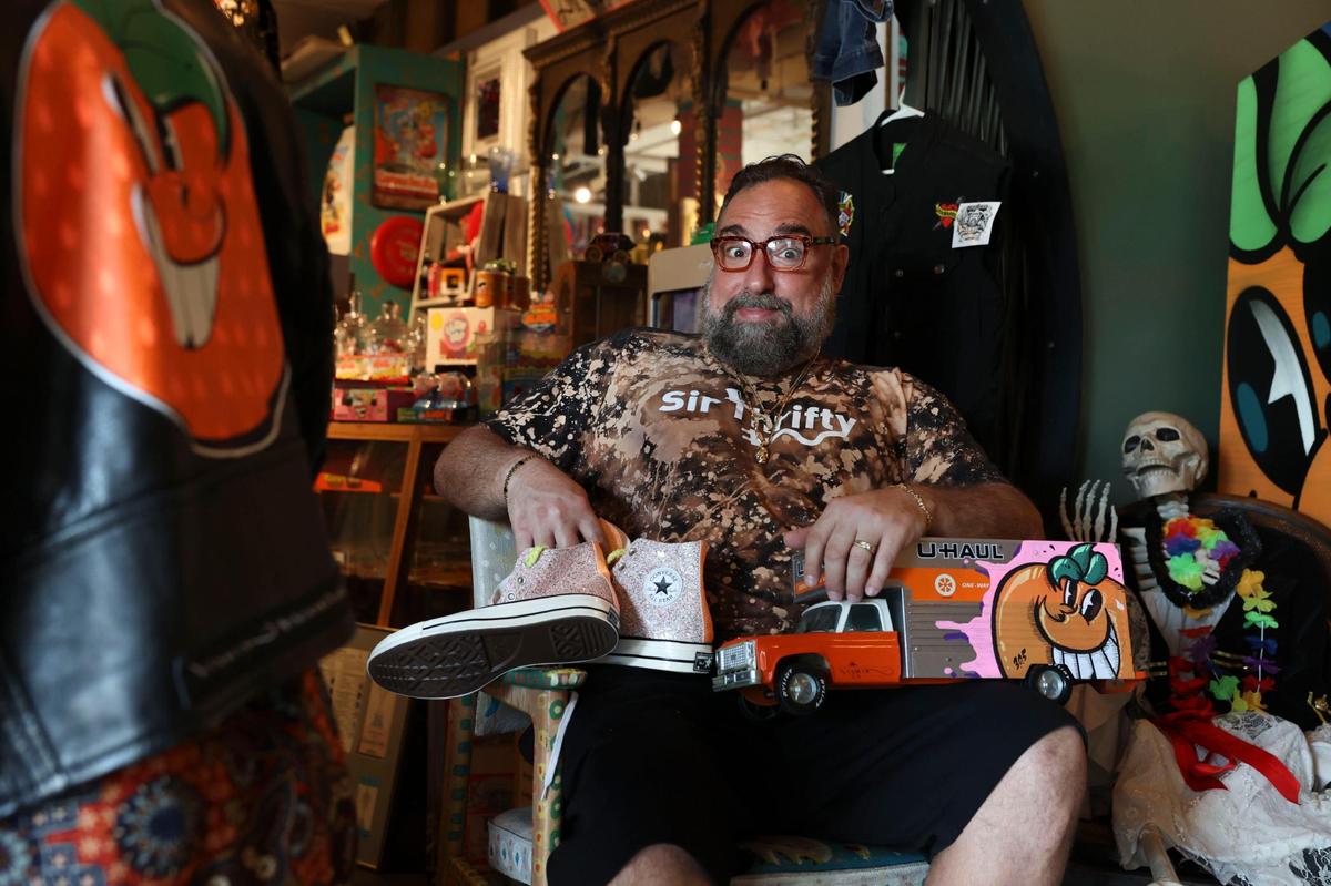 Nassie Shahoulian, owner of Sir Thrifty, poses in the entryway of the shop on Thursday, Aug. 25, 2022, at the Citadel in Miami Shores. “Most of the stuff in the store is from my personal collection,” said Shahoulian.