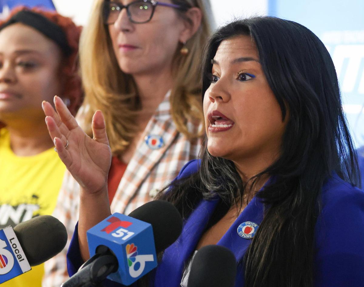 United Teachers of Dade (UTD) President Karla Hernández-Mats, union elected leadership, standing shoulder-to-shoulder with UTD members, discusses the successful conclusion of negotiations in 2023.