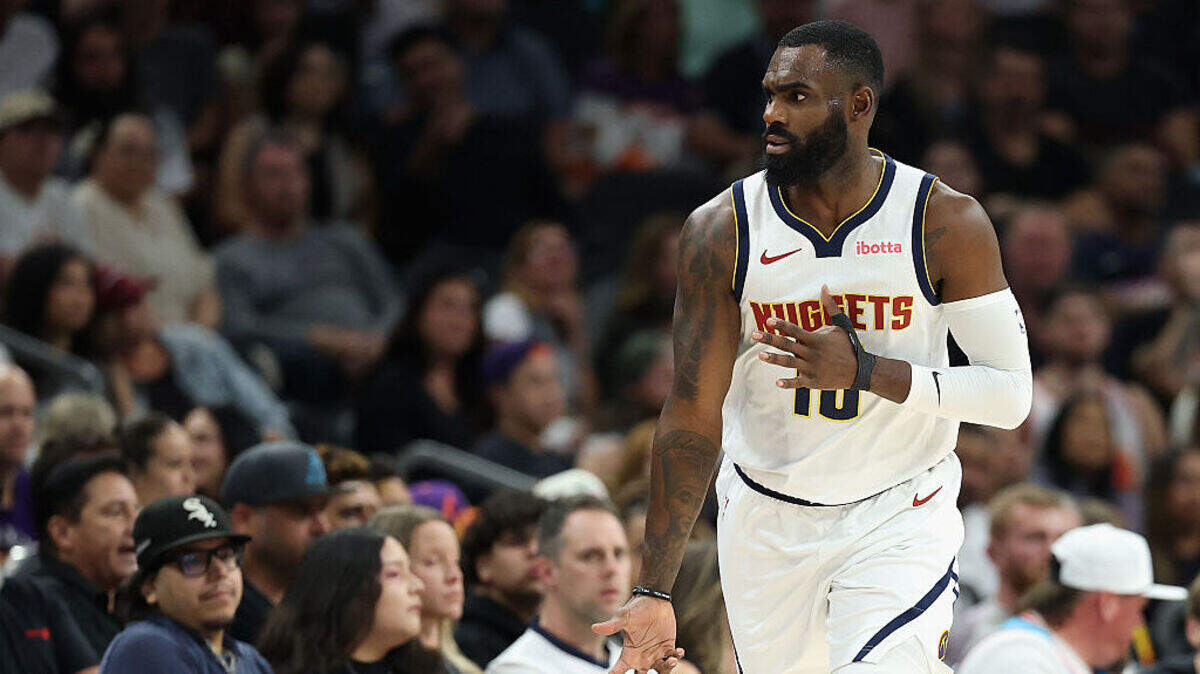 Tim Hardaway Jr. #10 of the Denver Nuggets reacts to a three-point shot against the Phoenix Suns during the first half of the NBA game at Mortgage Matchup Center on March 24, 2026 in Phoenix, Arizona.