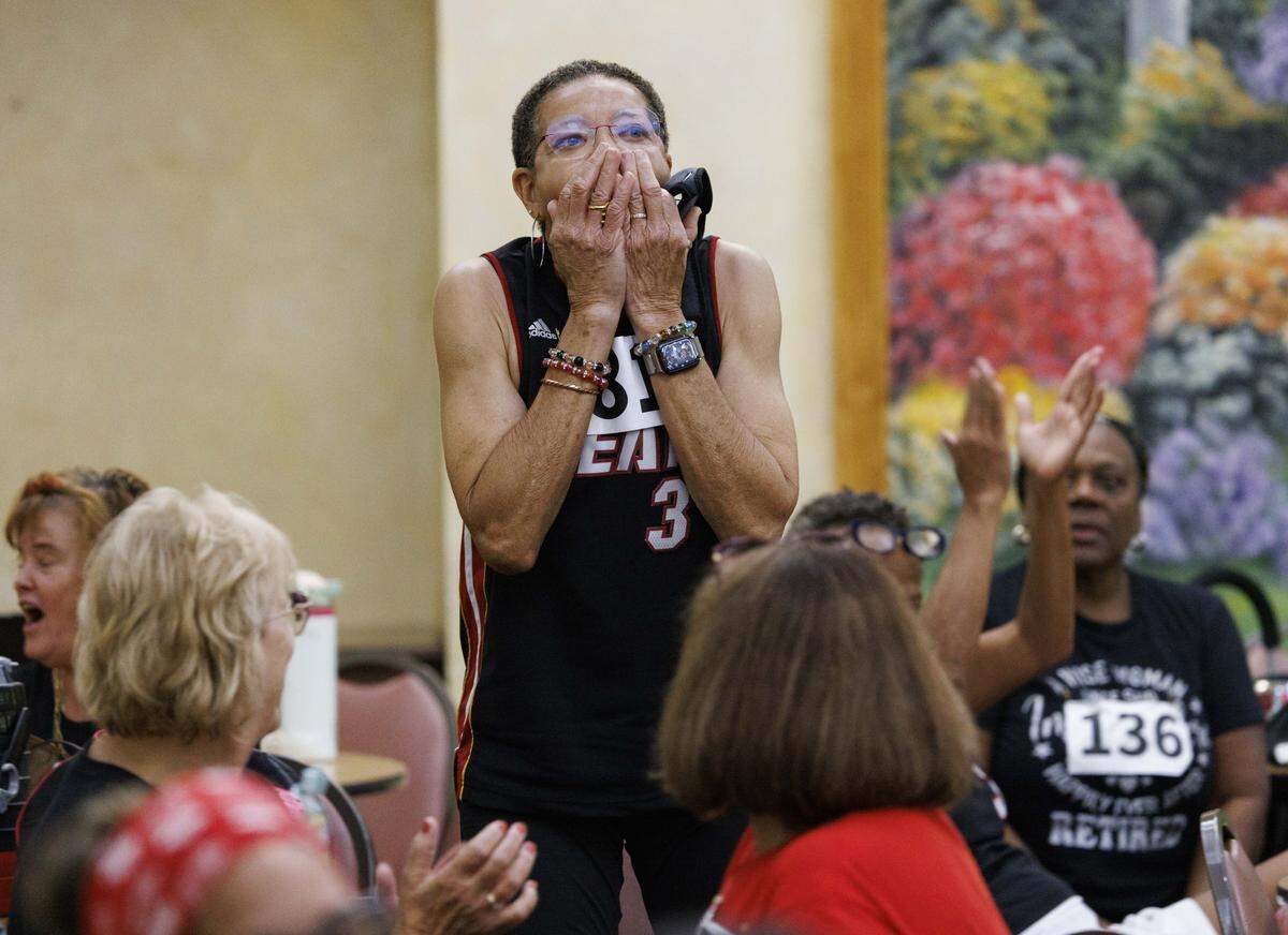 Deborah Bridges reacts to making the Heat Golden Oldies senior dance team on Thursday, Sept. 25, 2025, at Southwest Focal Point Community Center in Pembroke Pines, Fla.