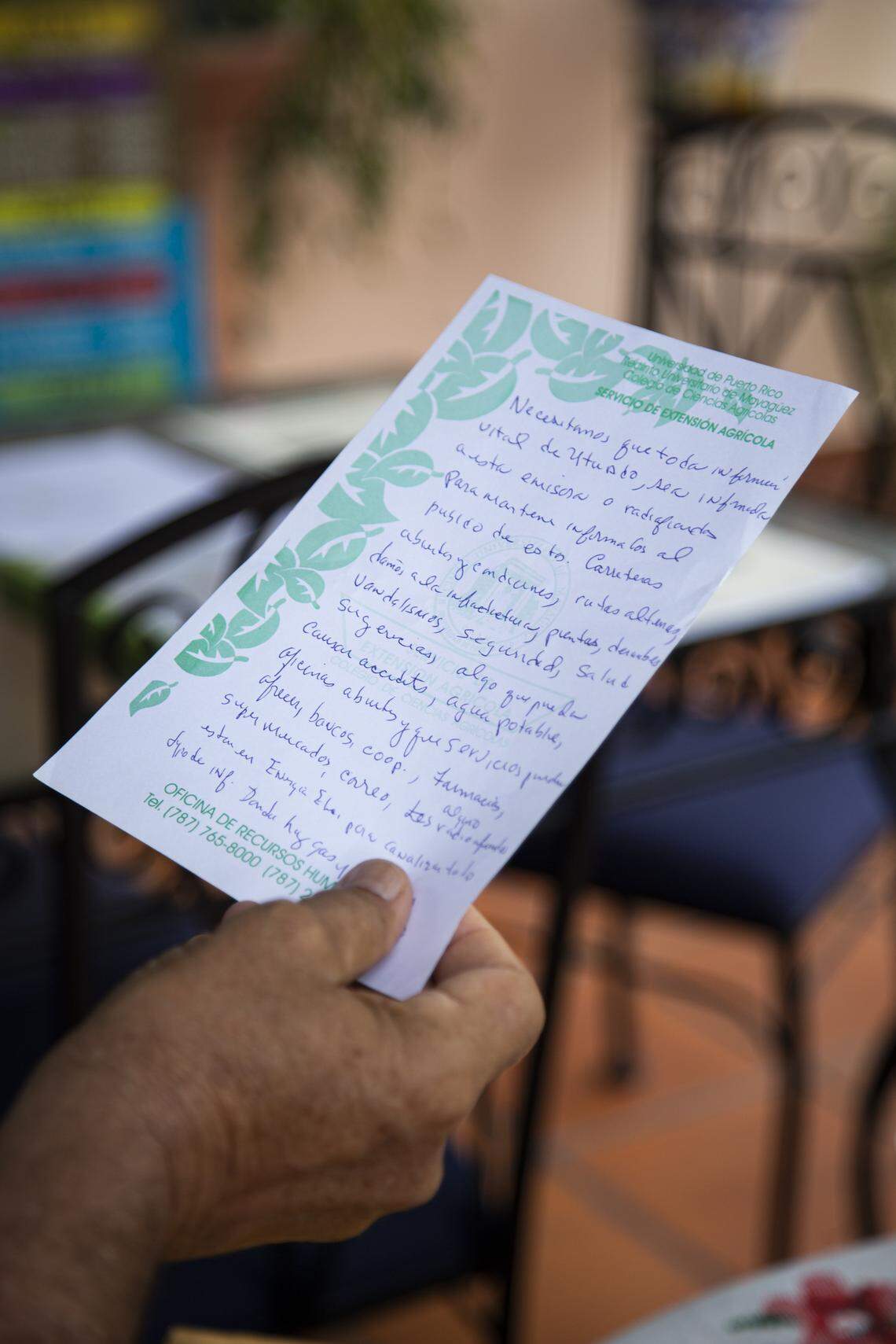 Pedro Labayen, founder of the Radio Amateur Association of Utuado, holds one of the messages he wrote and transmitted through a local radio station during Hurricane Maria.