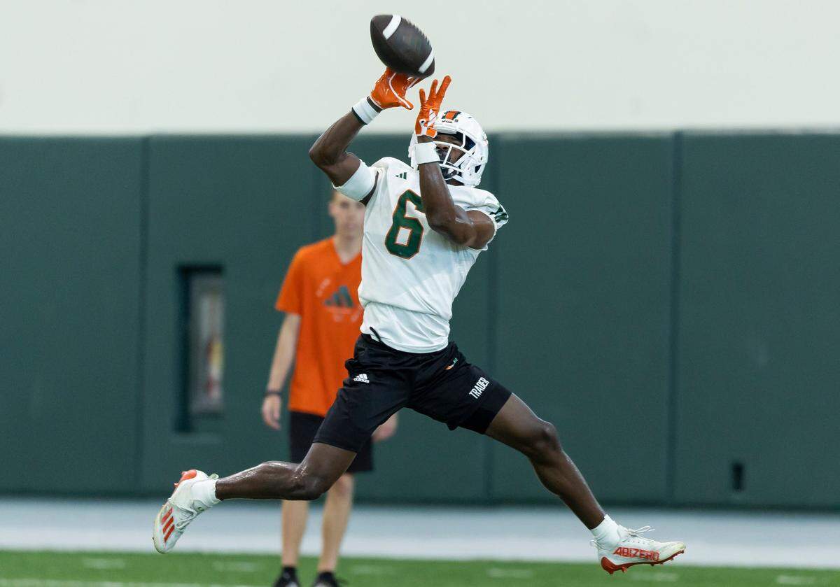 Miami Hurricanes wide receiver Joshisa “JoJo” Trader (6) catches the ball during practice at the Carol Soffer Indoor Practice Facility at the University of Miami on Monday, March 4, 2023 in Coral Gables, Fla.