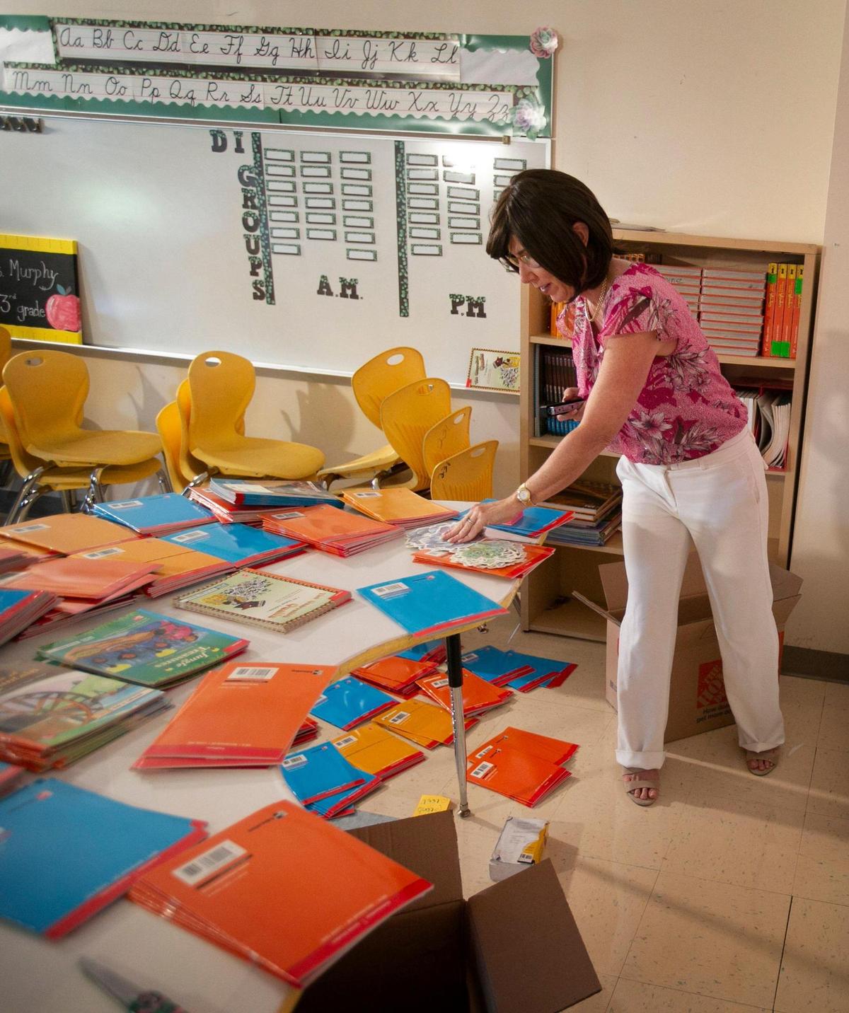 Teresa Murphy, a third-grade teacher at Spanish Lake Elementary School, was the 2022 Miami-Dade County Public Schools Teacher of the Year. Last year, she taught remotely from home due to health issues. This year, she is returning to her classroom to teach.  On Monday, Aug. 9, 2021, she was in her classroom getting ready for the start of the school year.