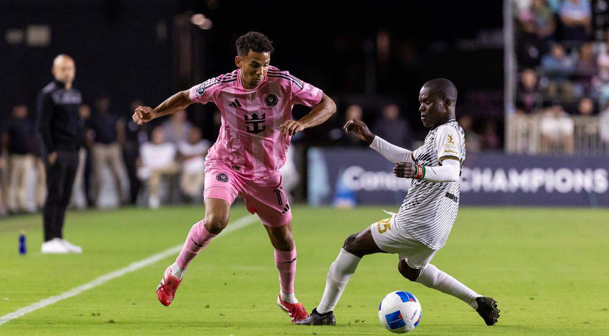 Inter Miami defender Ian Fray (17) and Cavalier FC forward Jamilhio Rigters (25) compete for the ball in the first half of their Concacaf Champions Cup match at Chase Stadium on Thursday, March 6, 2025, in Fort Lauderdale, Fla.