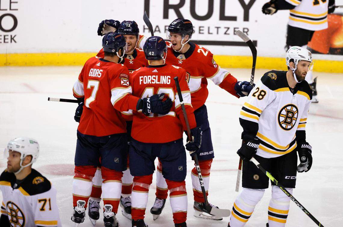 Florida Panthers center Eetu Luostarinen (27) is congratulated by teammates after scoring a goal against the Boston Bruin during the second period of an NHL game at the FLA Live Arena on Wednesday, October 27, 2021 in Sunrise, Fl.