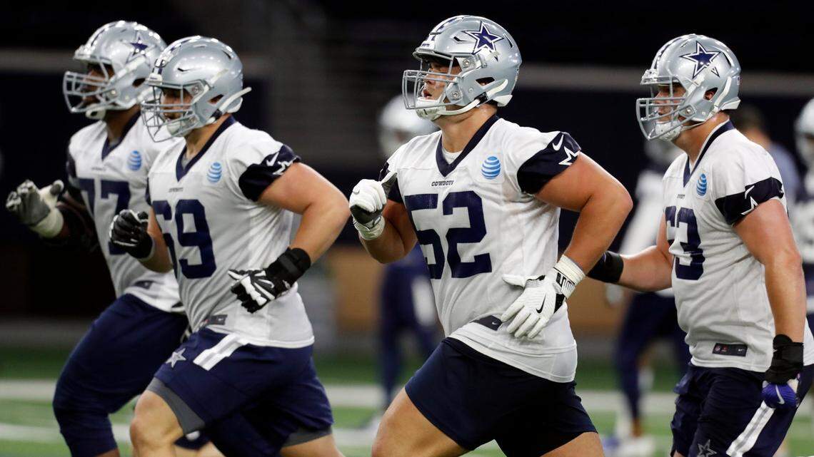 Dallas Cowboys guard Connor Williams (52) runs sprints to conclude the Dallas Cowboys minicamp at The Star in Frisco, Texas, Tuesday, June 11, 2019.
