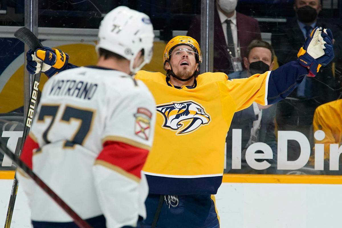 Nashville Predators center Nick Cousins, right, celebrates after scoring a goal against the Florida Panthers in the second period of an NHL hockey game Monday, April 26, 2021, in Nashville, Tenn. (AP Photo/Mark Humphrey)