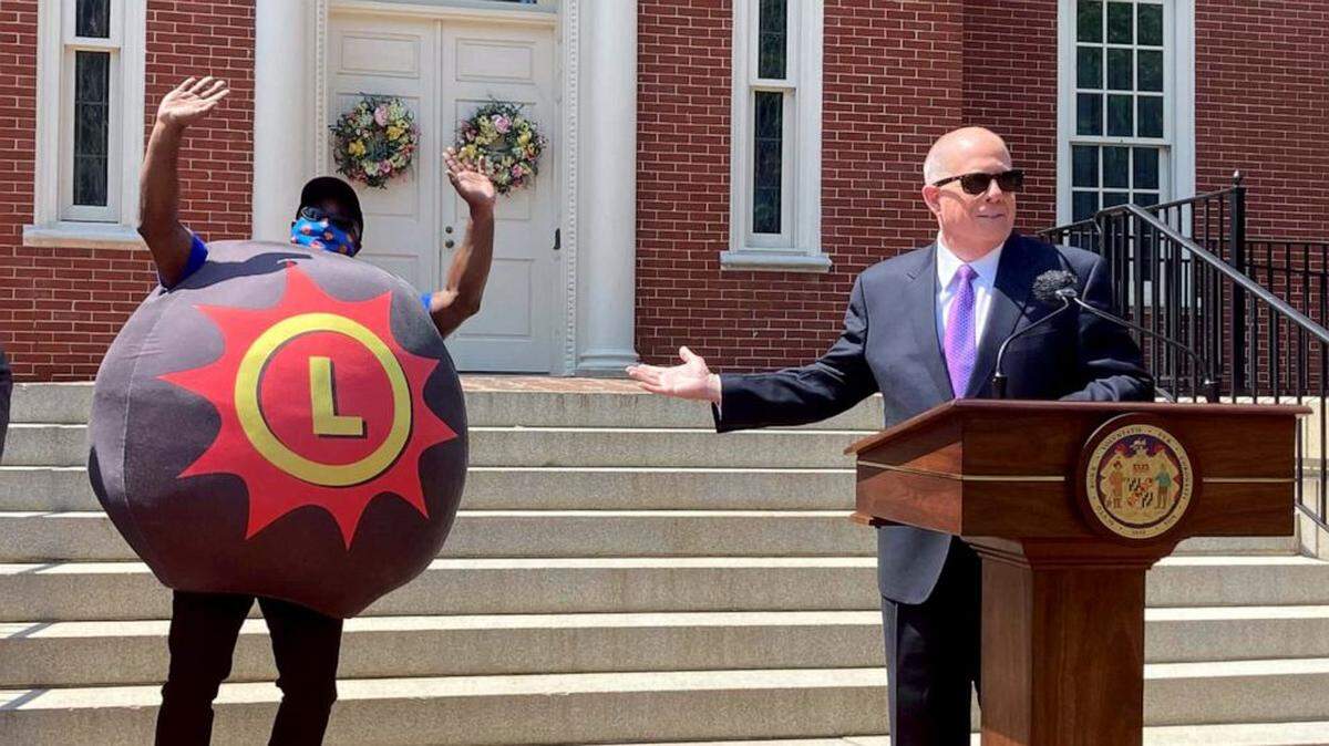 Maryland’s Gov. Larry Hogan introduces the mascot of the state’s lottery to get COVID-vaccine holdouts to change their minds.