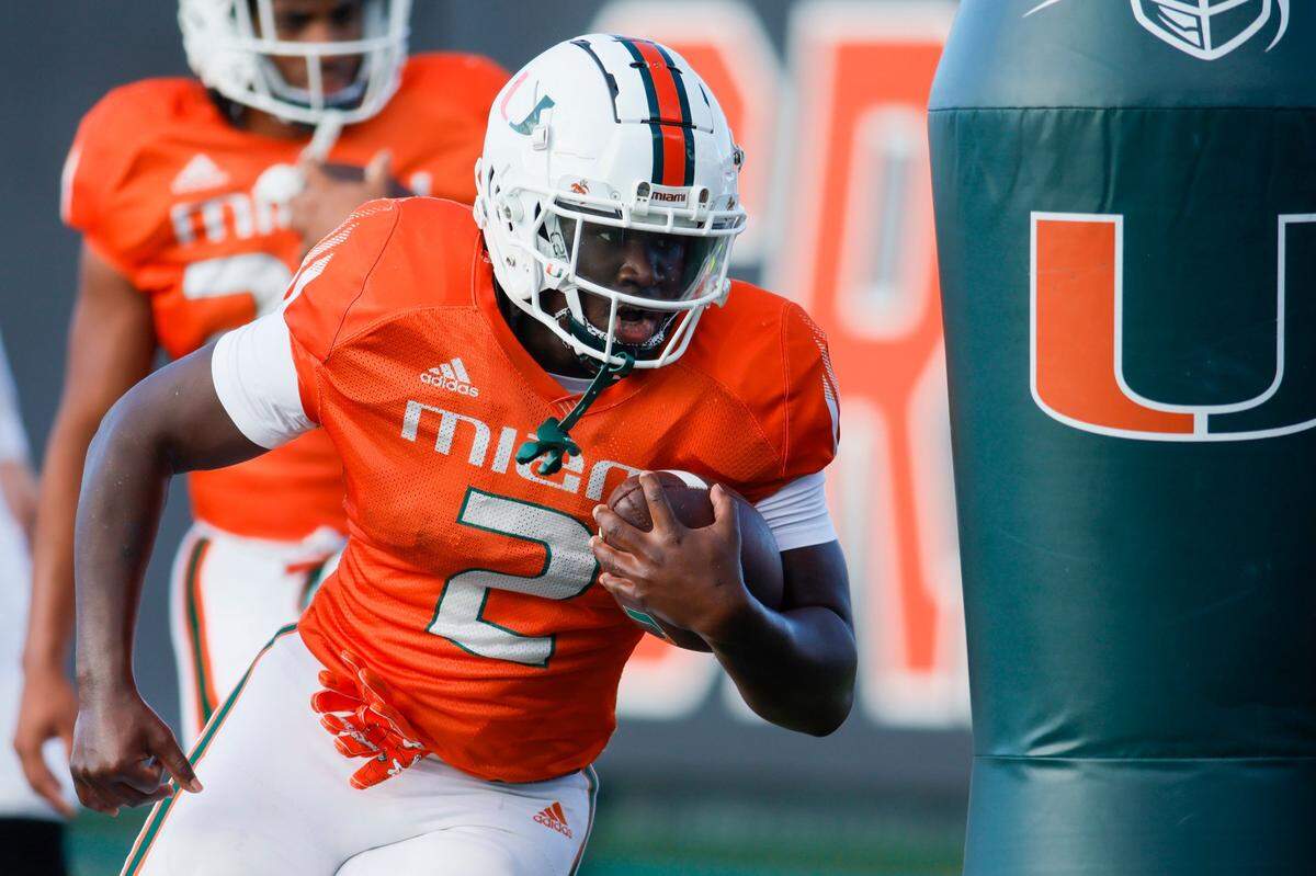 Miami Hurricanes running back Donald Chaney Jr. (2) works out during football practice at the University of Miami campus in Coral Gables, Florida, Thursday, March 23, 2023.