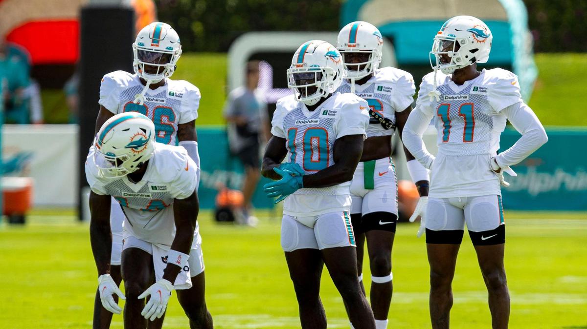 Miami Dolphins wide receiver corp line up for catching drills during Dolphins training camp at Baptist Health Training Complex in Miami Gardens on Saturday, August 6, 2022.