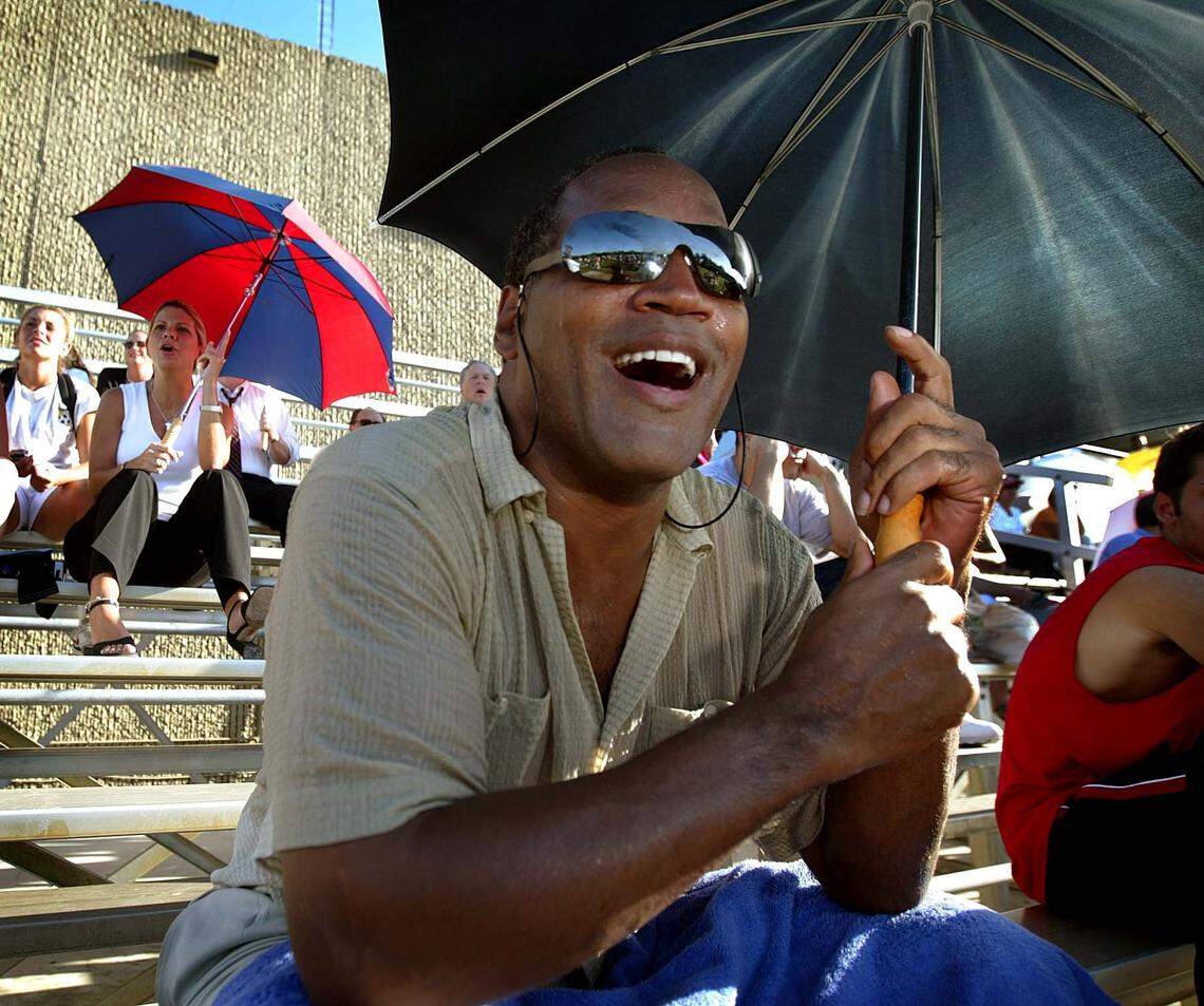 09/26/02 --Al Diaz/Miami Herald--Miami--In 2002, O.J. Simpson watches his son, No. 39 Justin Simpson, a ninth-grader at Gulliver Prep and JV football player.