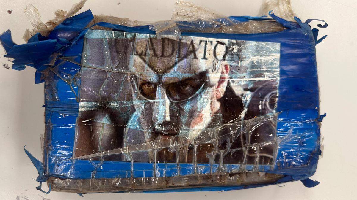 A brick of cocaine with a picture of a Gladiator on the wrapping washed up in the Florida Keys Wednesday, July 2, 2025.