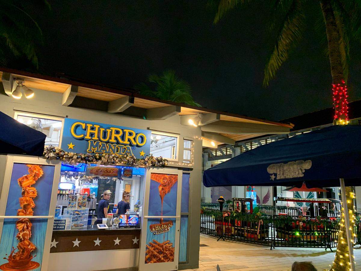 Churro shops, like this eatery in The Falls mall in South Miami-Dade on Dec. 23, 2022, may do better than usual business as strollers and last minute shoppers try to beat the chill. Temperatures will only climb from the early morning low of 48, the third coldest day of 2022, to about 60, according to the National Weather Service in Miami.