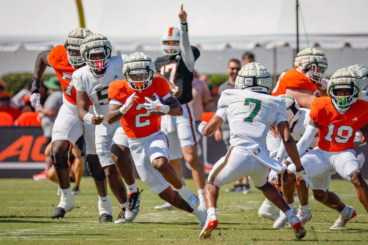 UM’s running back Jordan Lyle	(2) carries the ball in the first half during the Miami Hurricanes football spring game on at Cobb Stadium on UM’s campus in Coral Gables, Florida on Saturday, April 12, 2025. 