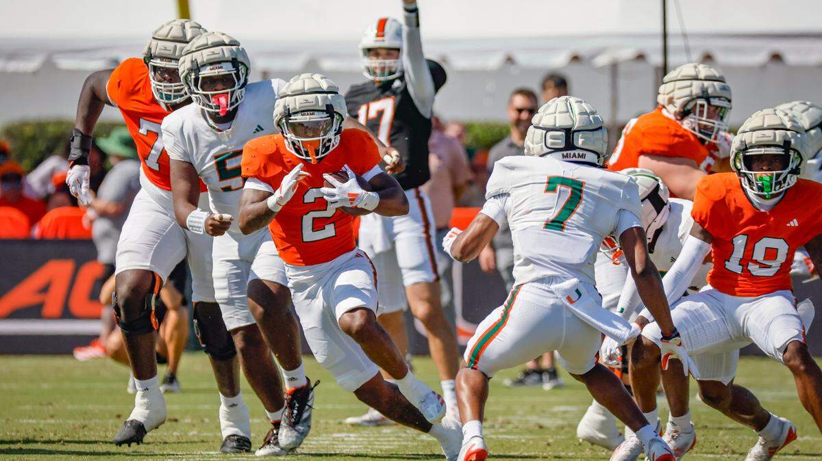 UM’s running back Jordan Lyle	(2) carries the ball in the first half during the Miami Hurricanes football spring game on at Cobb Stadium on UM’s campus in Coral Gables, Florida on Saturday, April 12, 2025. 