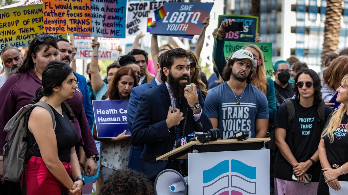 Kaleb Hobson-Garcia, a transgender man, drove from Tallahassee to speak during a press conference in front of the Marriott Fort Lauderdale Airport as the Florida Board of Medicine met in August 2022.