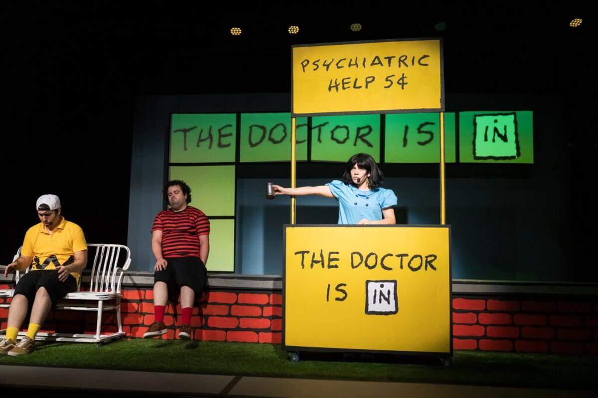 From left, Sergio Tamayo, Pable de Pablo and Jessica Calle bring the iconic Peanuts’ characters of Charlie Brown, Linus and Lucy to life at the Miami Children’s Museum.