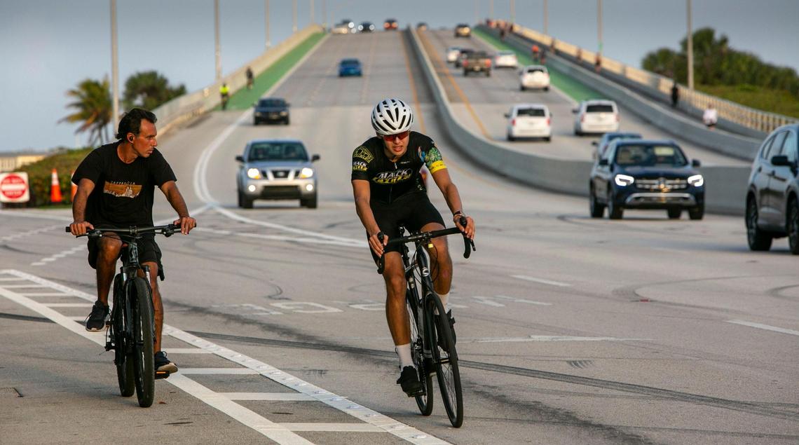Cyclists on the Rickenbacker Causeway head west after coming down the William Powell Bridge. The Rickenbacker, which connects Key Biscayne to the Miami mainland, and Venetian Causeway to Miami Beach, would be upgraded under a privatization plan by Miami-Dade County.