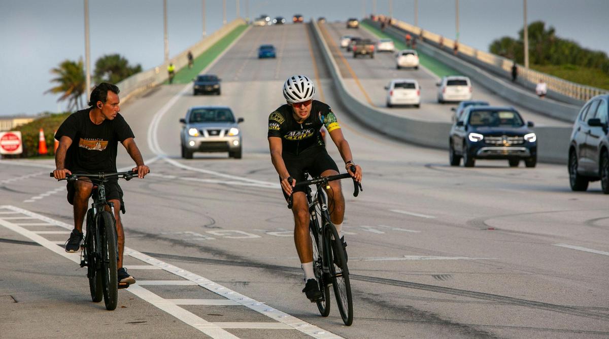 Cyclists on the Rickenbacker Causeway head west after coming down the William Powell Bridge. A large number of cyclists, runners and walkers have made the stretch of road between Miami and Key Biscayne a very popular recreational route with great risk for accidents.