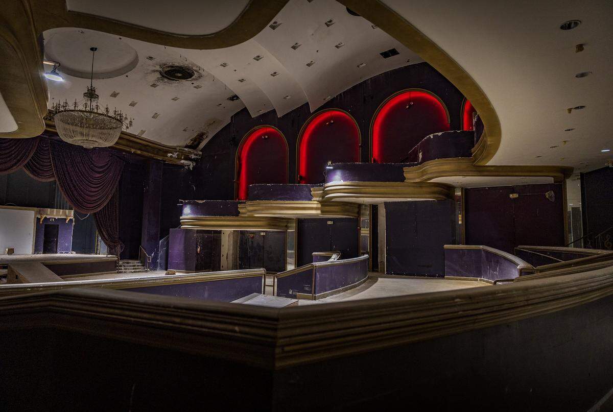 View of the ground floor and mezzanine including the balconies inside the former Playboy Plaza Hotel Theater, located inside The Castle Beach, 5445 Collins Ave. in Miami Beach. The venue, seen Friday, Nov. 14, 2025, is closed and up for sale.