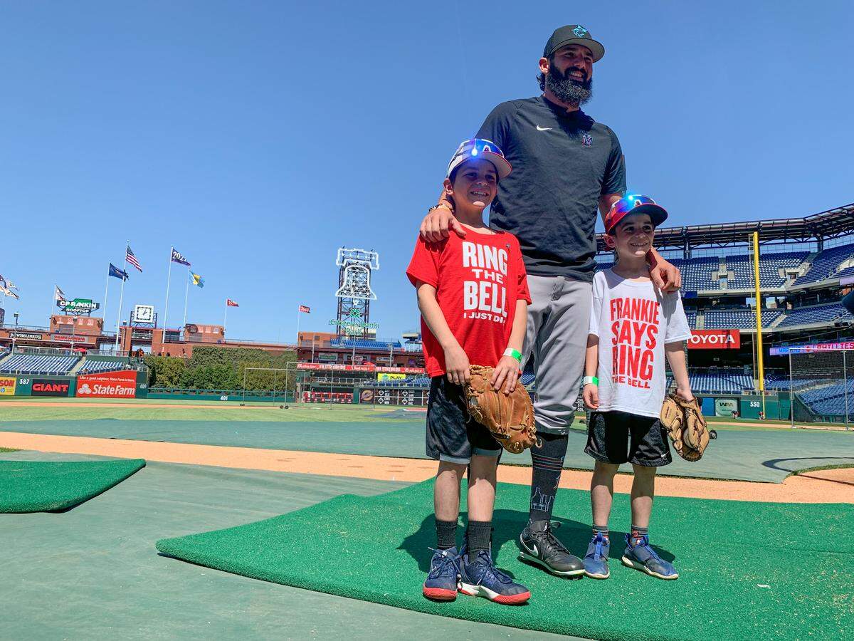 Miami Marlins relief pitcher Devin Smeltzer (center) poses for a picture with Frankie LaSasso (left) and Gino LaSasso (right) at Citizens Bank Park on Wednesday, April 12, 2023.