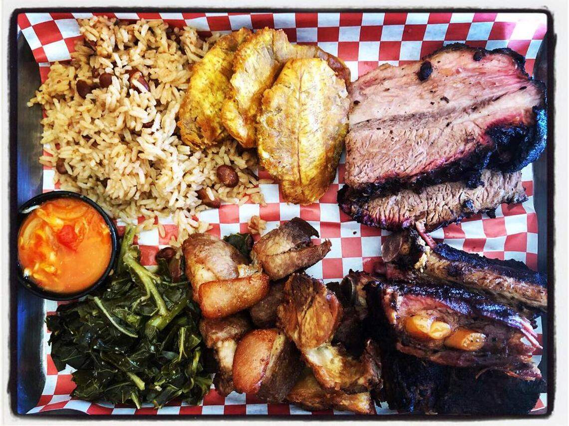 Lovers of roadside barbecue followed Bon Gout Barbecue all over Little Haiti for their barbecue ribs and smoked brisket. So with development encroaching, the owners decided to open a full restaurant of what they’re calling Haitian barbecue — American Southern barbecue made with Haitian seasonings, and serving sides like bannan peze, collards with Haitian ingredients and extra-hot pikliz.