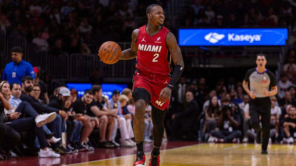 Miami Heat guard Terry Rozier (2) dribbles up court during the first half of an NBA game against the Miami Heat at Kaseya Center on Nov. 26, 2024, in Miami.