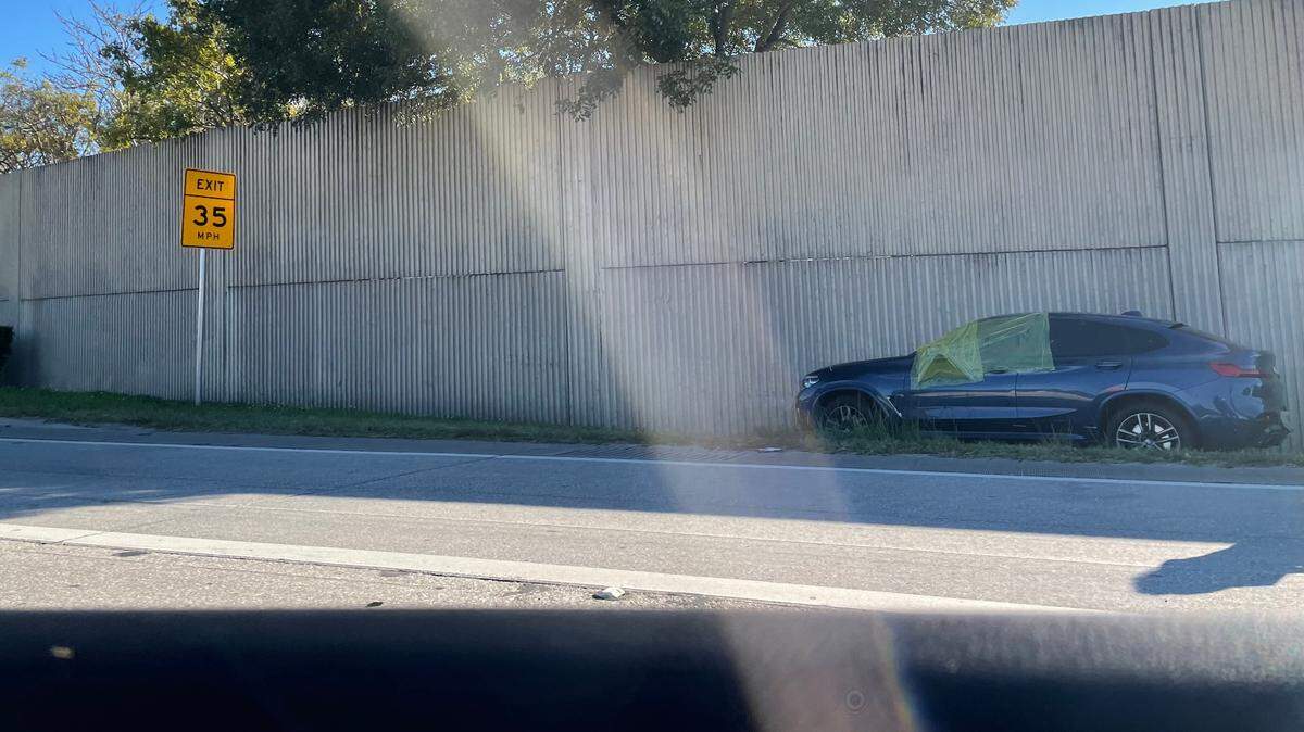 A woman was taken to the hospital after she was shot at while driving on Interstate 95 near the NW 103rd Street exit in Miami-Dade County, police say.