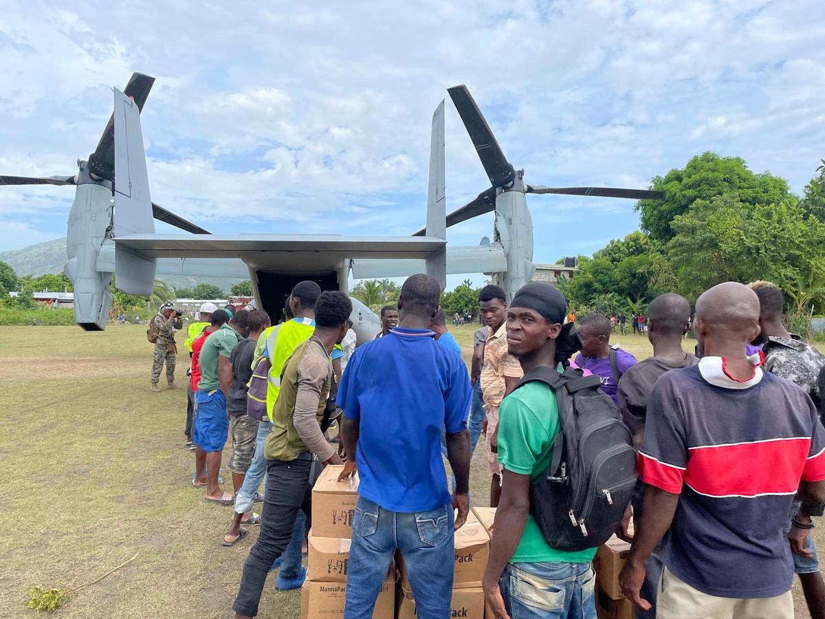 U.S. military aircraft drops off aid on Friday, Aug. 21, 2021, to Les Anglais, a remote community on Haiti’s southern peninsula that was devastated by the Aug. 14 earthquake.