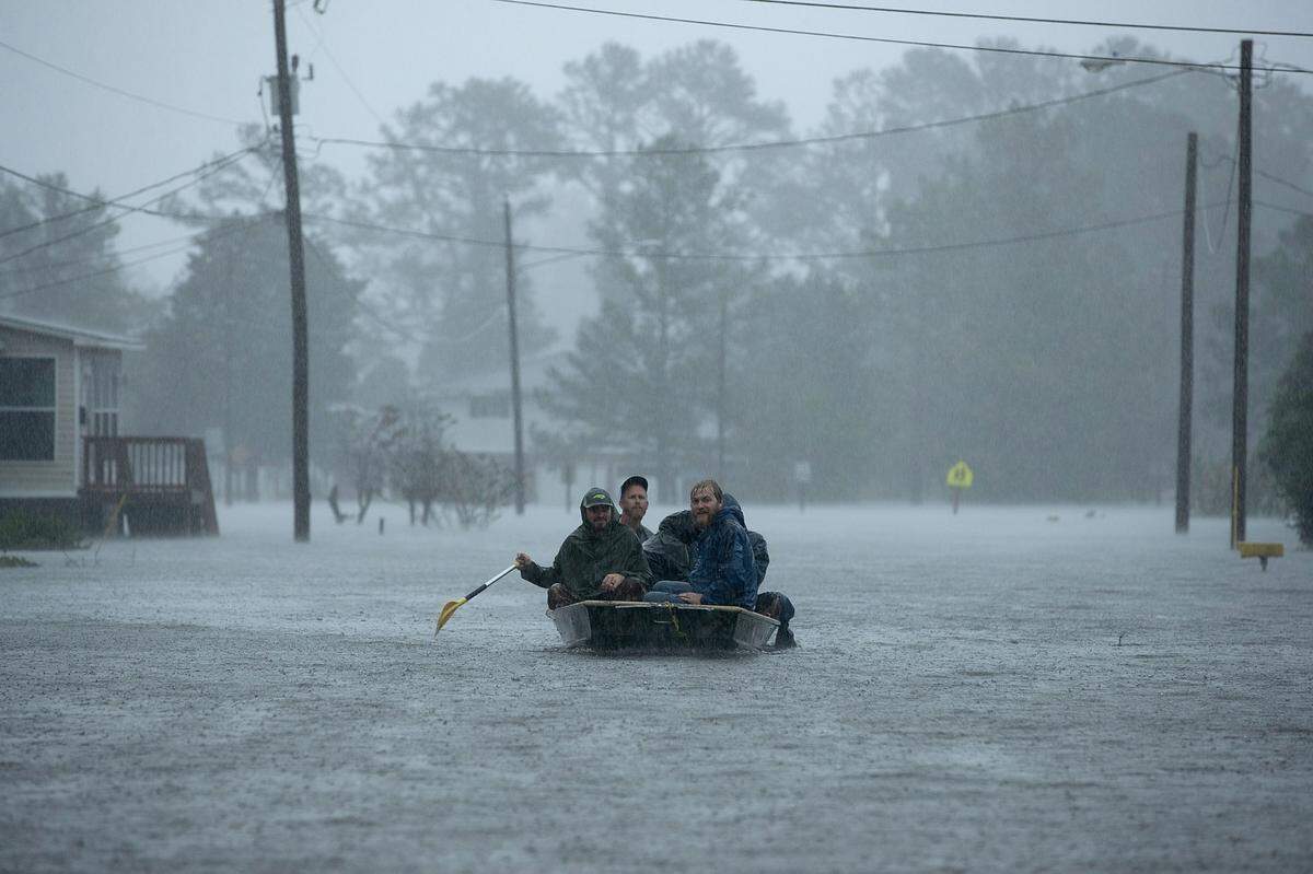 Volunteers helped rescue residents from their flooded homes in New Bern, where a third of the town’s homes were damaged by Hurricane Florence. Photo by Chip Somodevilla/Getty Images