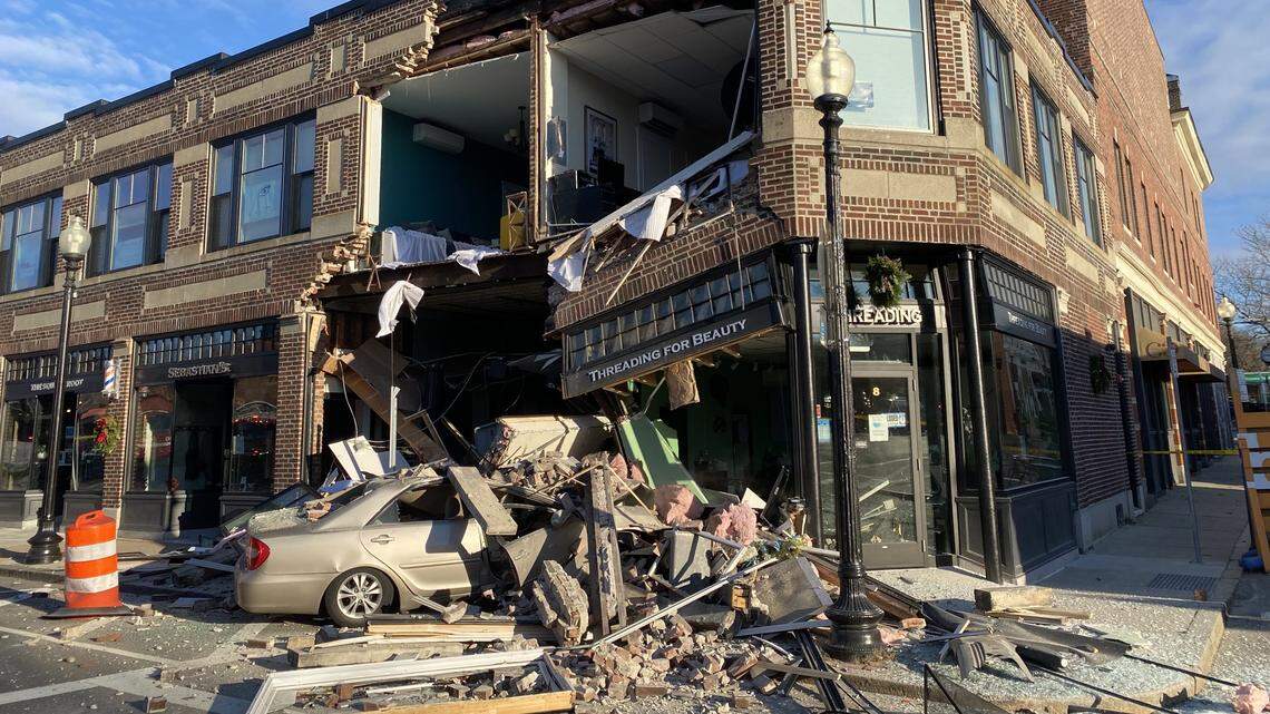 A car crashed into a “block of stores” in Boston, and firefighters evacuated the building.