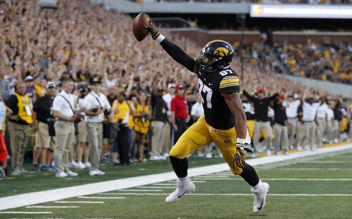 Iowa tight end Noah Fant scores on a 5-yard touchdown pass during the first half of an NCAA college football game against Northern Iowa, in Iowa City, Iowa. Fant is a possible pick in the 2019 NFL Draft.