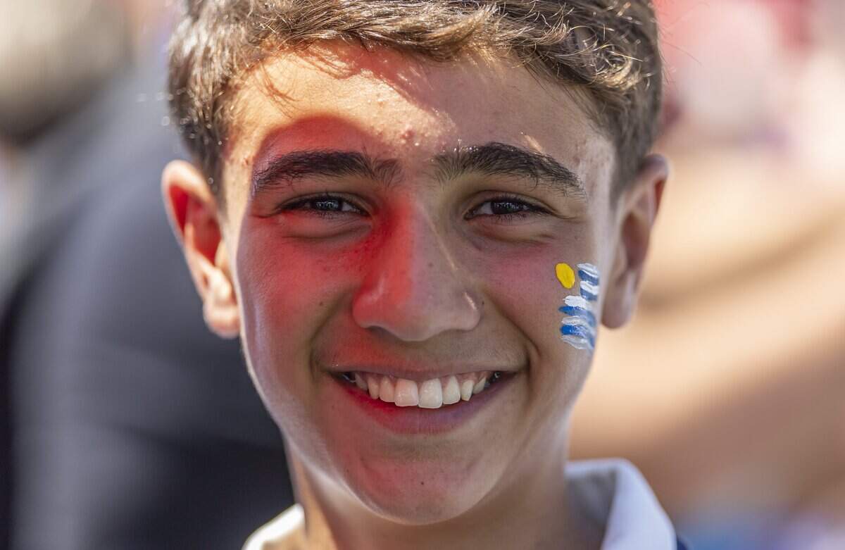 Mateo Gavirondo, 13, reacts as he arrives to Hard Rock Stadium before his team's World Cup Group H soccer match against Cape Verde on Sunday, June 21, 2026, in Miami Gardens, Fla.