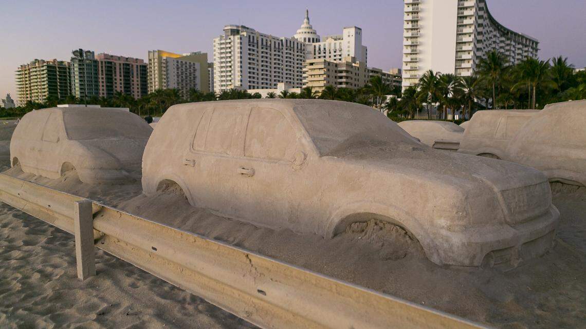 Argentinean artist Leandro Erlich’s “Order of Importance,” which is made of 66 life-size sand sculptures of cars, can be seen on display in Miami Beach on Tuesday, December 3, 2019. The exhibition can be found at the end of Lincoln Road on Miami Beach.