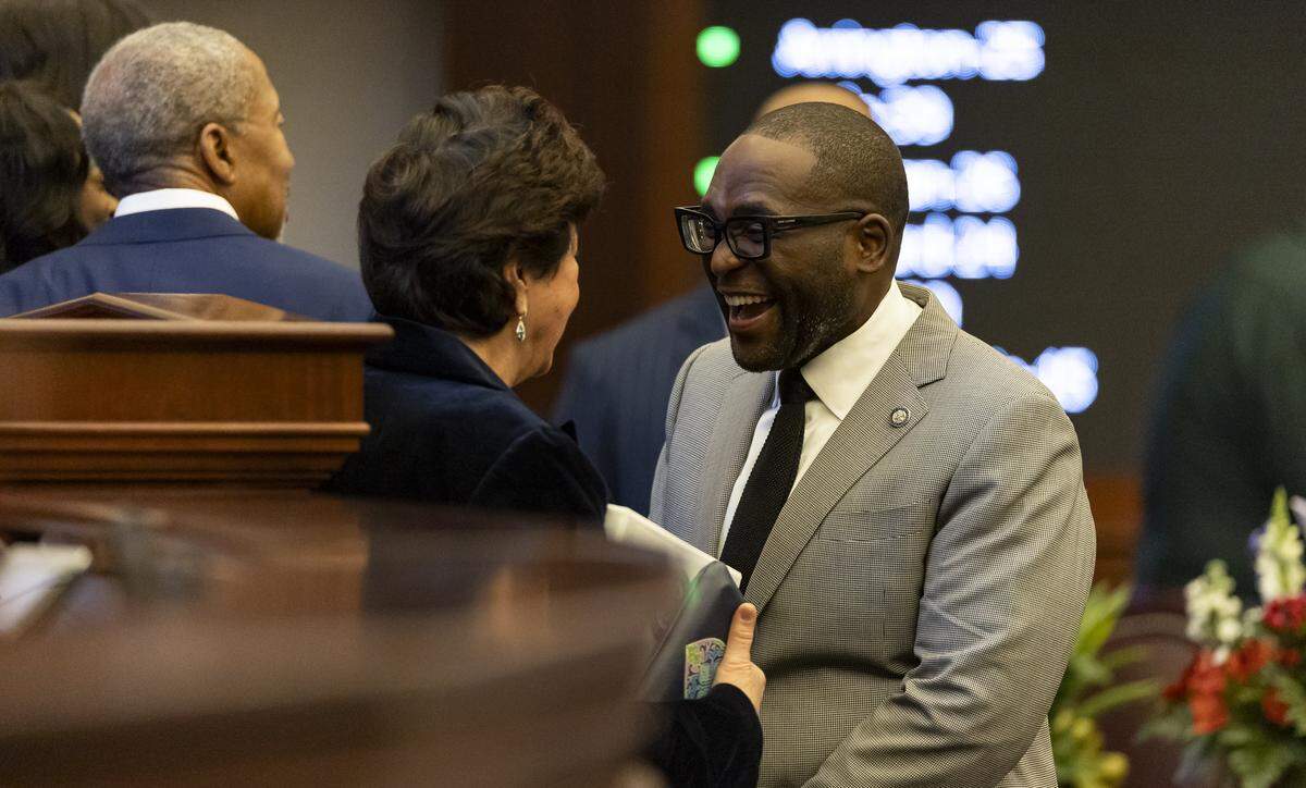 Former Senate President Kathleen Passidomo, R-Naples, speaks with Sen. Shevrin Jones, D-Miami Gardens, during the first day of the legislative session at the Florida State Capitol on Tuesday, Jan. 13, 2026, in Tallahassee, Fla.