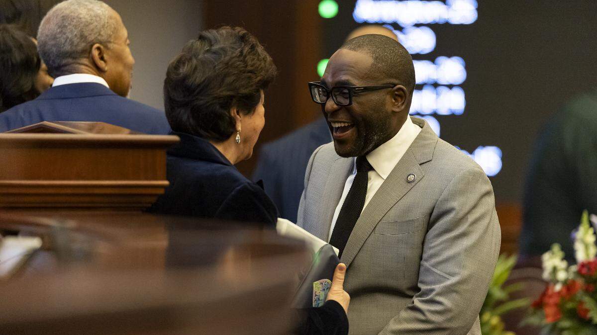 Former Senate President Kathleen Passidomo, R-Naples, speaks with Sen. Shevrin Jones, D-Miami Gardens, during the first day of the legislative session at the Florida State Capitol on Tuesday, Jan. 13, 2026, in Tallahassee, Fla.