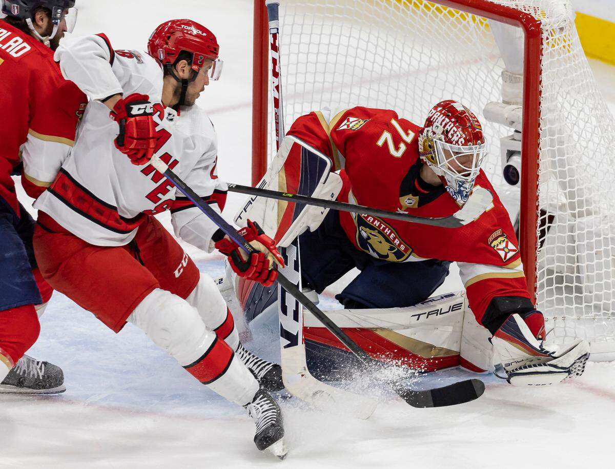 Florida Panthers goaltender Sergei Bobrovsky (72) blocks a shot from Carolina Hurricanes center Jordan Staal (11) in the third period of Game 3 of the NHL Stanley Cup Eastern Conference finals series at the FLA Live Arena on Monday, May 22, 2023 in Sunrise, Fla.