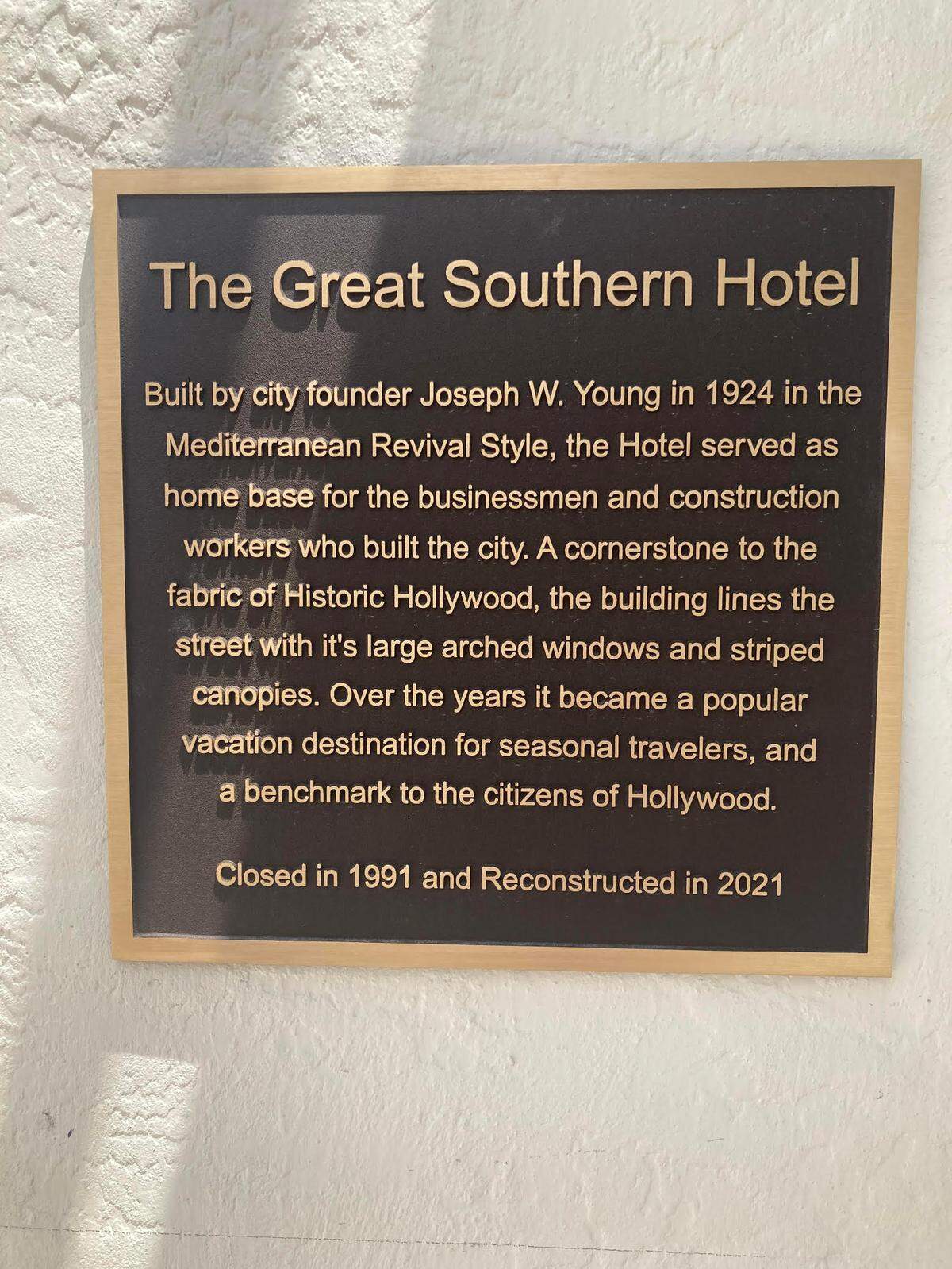 A history plaque on the replica building of the Great Southern Hotel.