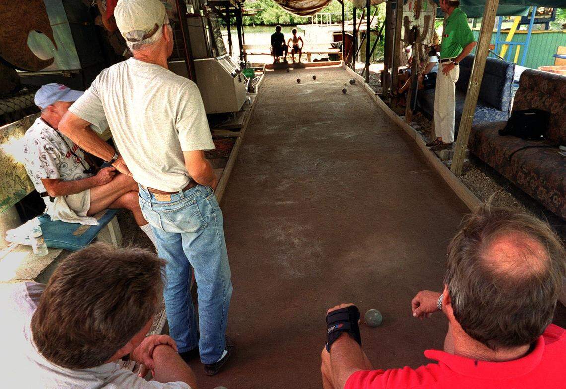 In 2000, Jack Hunt watches the ball roll down the court.