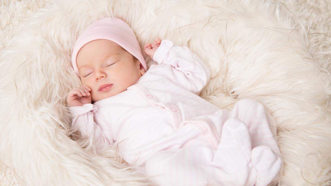 newborn baby girl sleeping