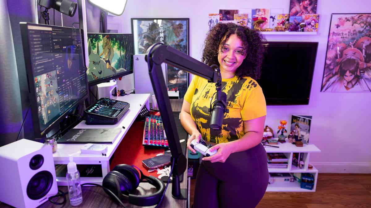 Natasha Walsh, a Twitch streamer and social media influencer, is photographed at her home on Thursday, April 3, 2025, in Miami. Walsh, whose Twitch handle is BarefootTasha, streams for about five to six hours a day, five times a week, and has almost 40,000 followers on Twitch.