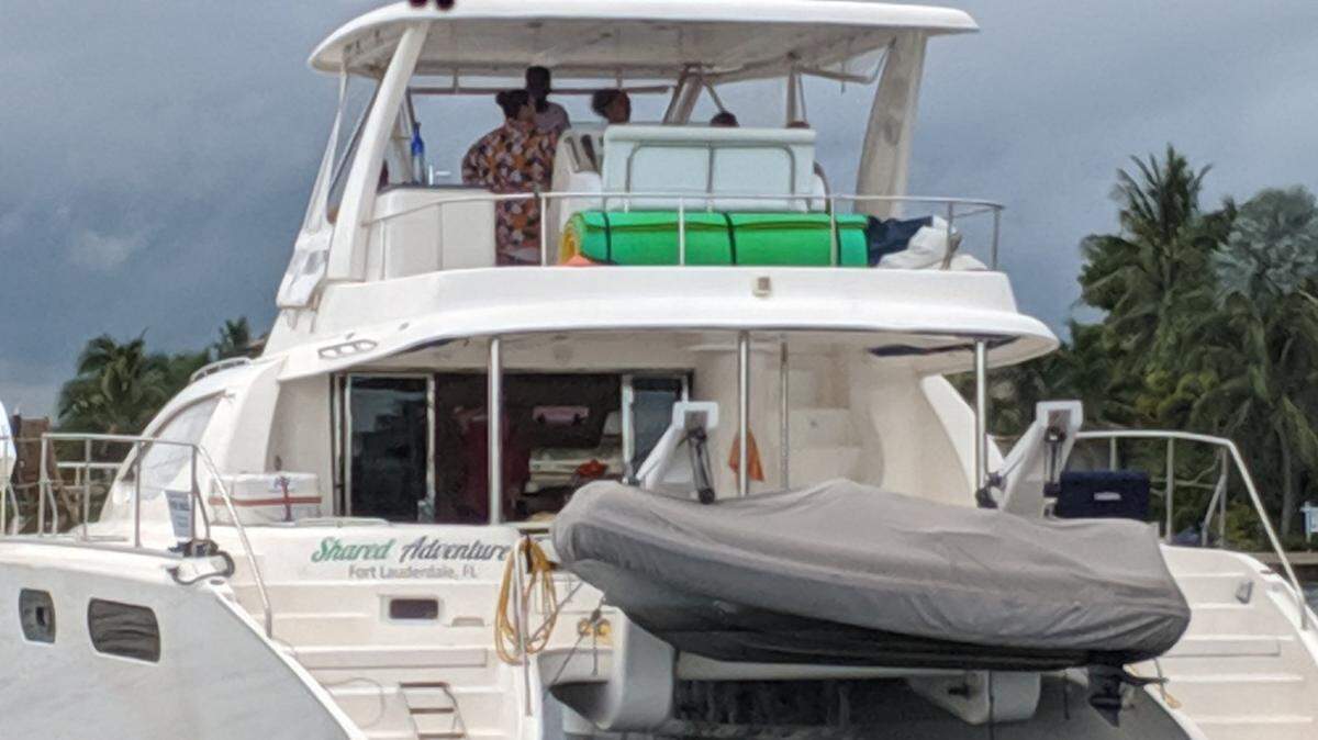 A U.S. Coast Guard crew stopped a 47-foot catamaran named Shared Adventure Aug. 11 for conducting an illegal charter.