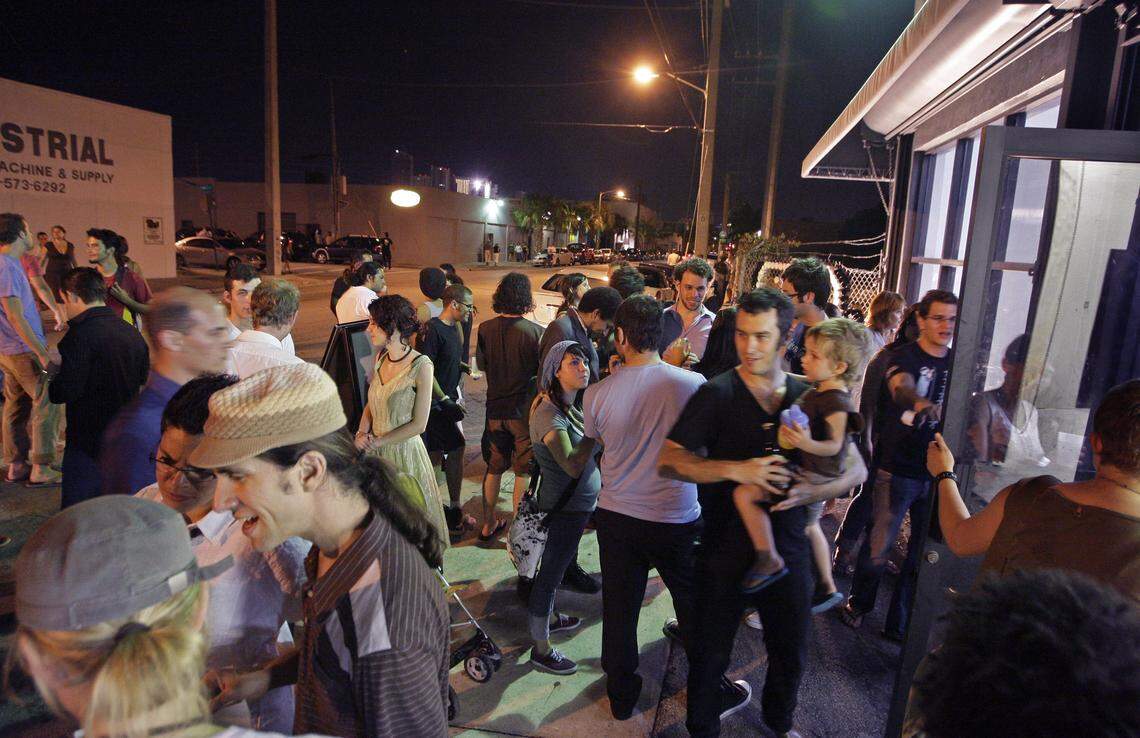 A crowd gathers outside Spinello Gallery at 2294 NW 2 Ave. in Wynwood during one of the monthly Second Saturday art walks through the neighborhood in 2008.