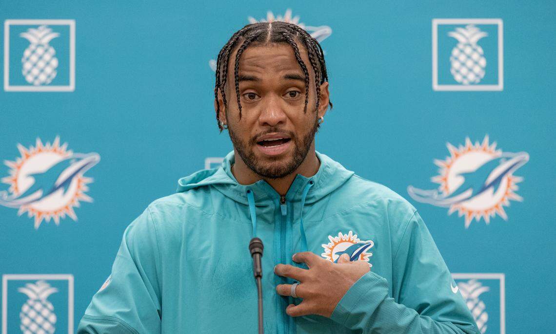Miami Dolphins quarterback Tua Tagovailoa (1) speaks with reporters after practice at the Baptist Health Training Complex on Thursday, Sept. 25, 2025, in Miami Gardens, Fla.