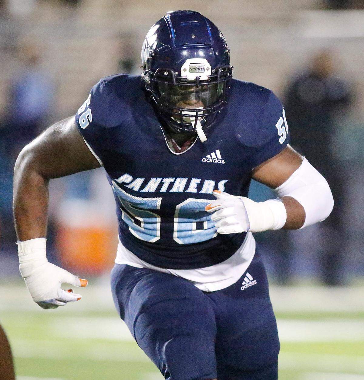 Palmetto Panthers defensive line Leonard Taylor (56) during the FHSAA Class 8A state semifinal football game against Osceola Kowboys on Saturday, December 12, 2020 at Traz Powell stadium in Miami