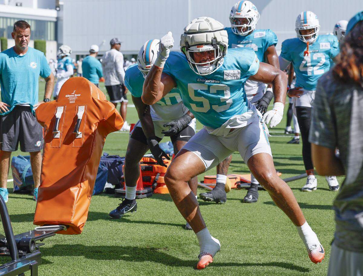 Miami Dolphins Miami Dolphins linebacker Cameron Goode (53) runs through drills during an NFL football joint practice with the Jacksonville Jaguars at the Miami Dolphins Training Camp.